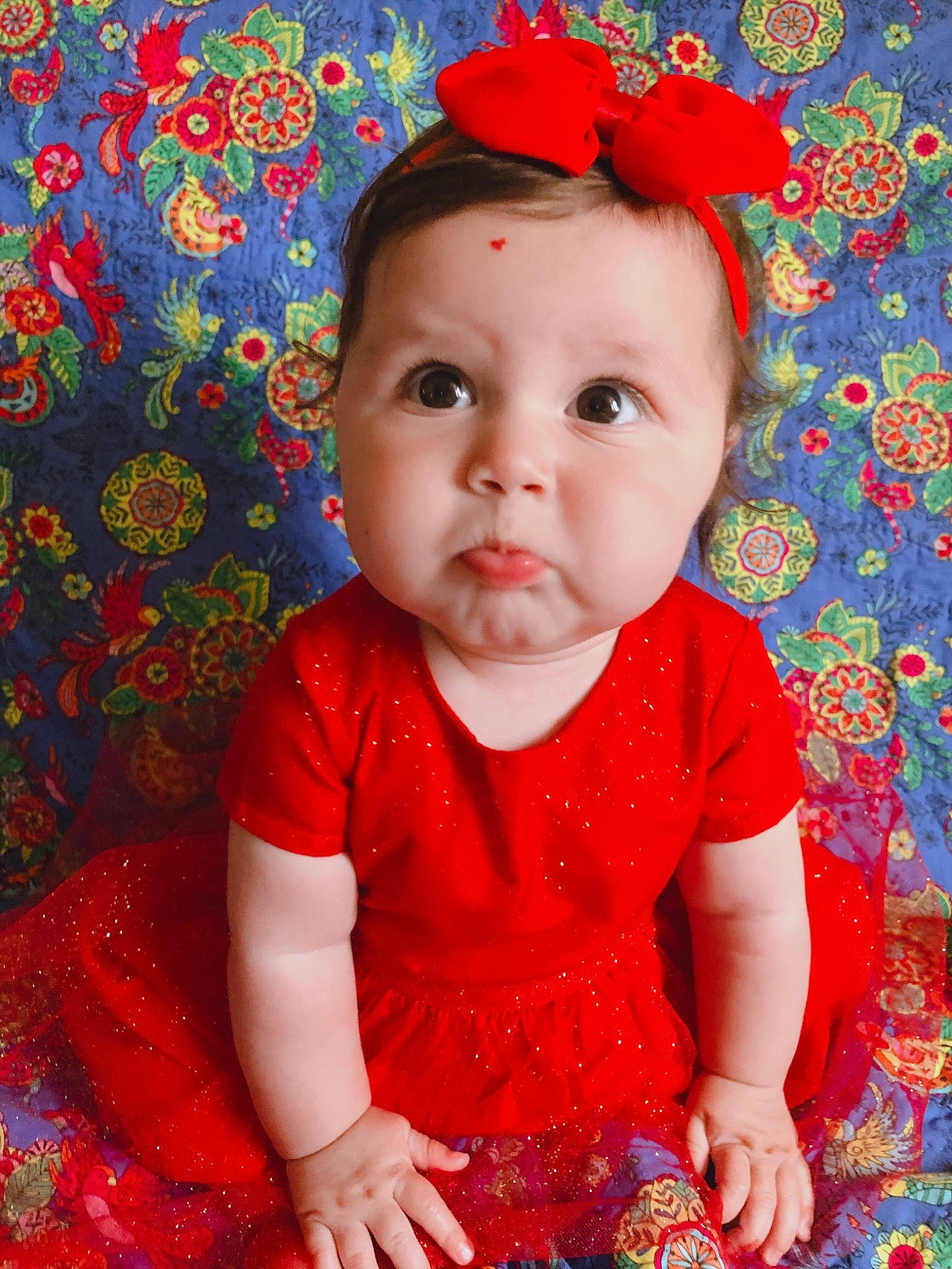 Ava-rae is registered to the contest to win money with this photo: baby, baby_toddler_clothing, cheek, child, pattern, person, red, textile, toddler