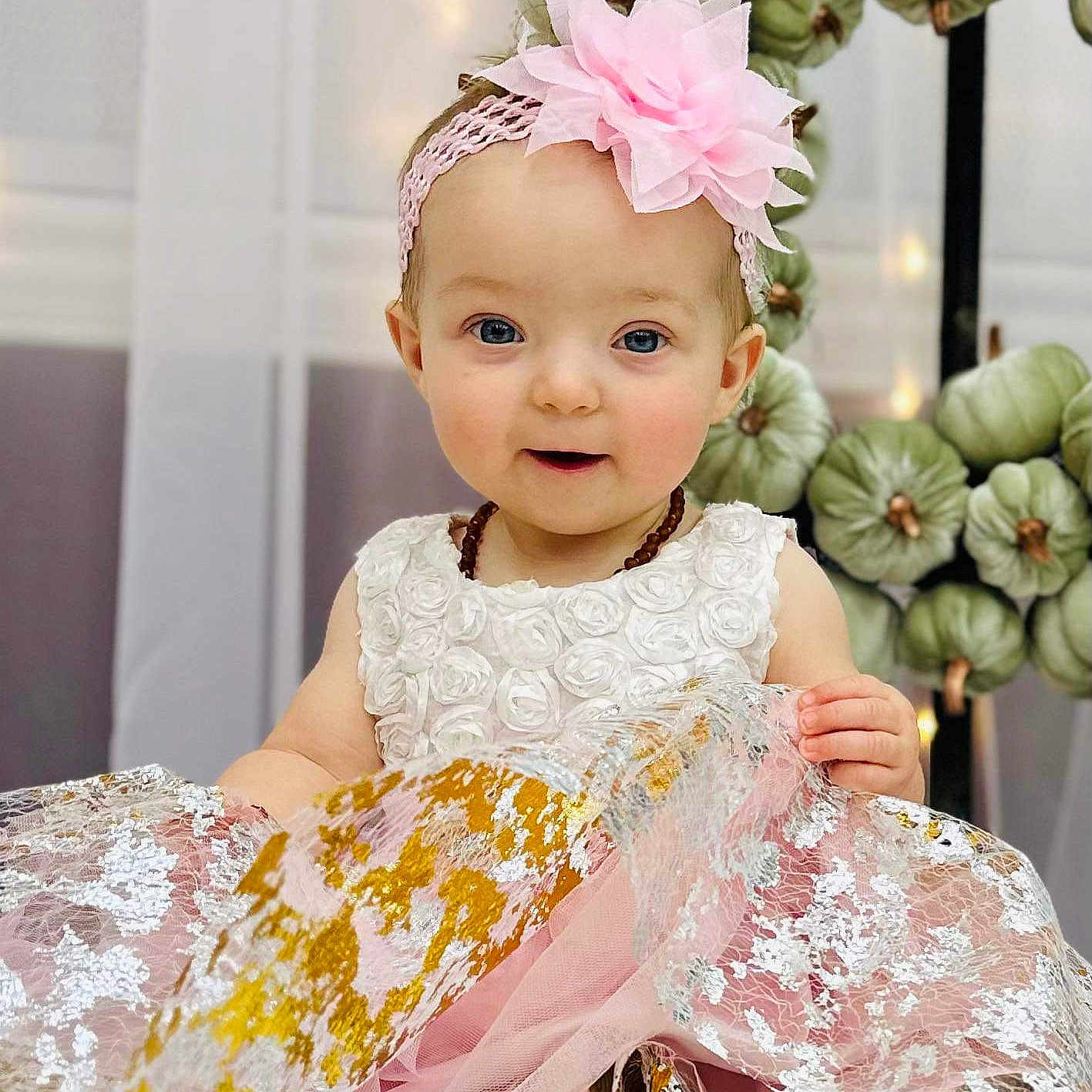 Sophia joined the competition — help win amazing prizes! accessories, baby, brownhair, clothing, dress, face, fashion, flower, flowerarrangement, formalwear, gown, hair, happy, head, person, photography, portrait, sitting, sleeve, smile