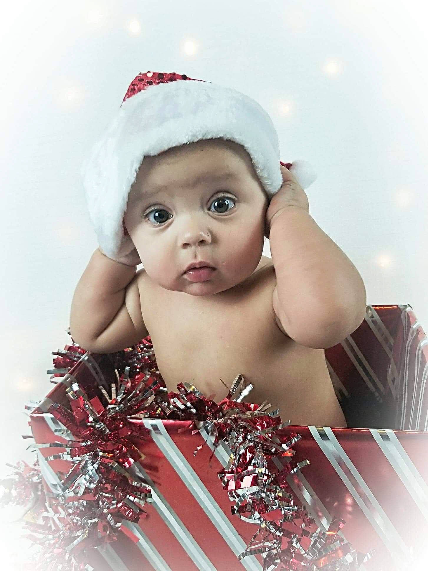 Tyson is registered to the contest to win money with this photo: baby, beauty, child, child_model, christmas, face, fashion_accessory, fictional_character, fun, hair_accessory, happy, head, headgear, headpiece, headwear, lip, person, photography, skin, smile