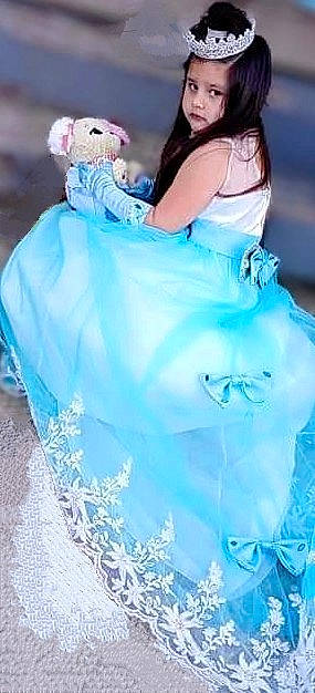 Reina joined the competition — help win amazing prizes! aqua, azure, blue, bridal_accessory, bridal_clothing, bridal_party_dress, dress, electric_blue, event, fashion_design, flash_photography, formal_wear, gown, happy, person, petal, photograph, pink, toy, wedding_ceremony_supply