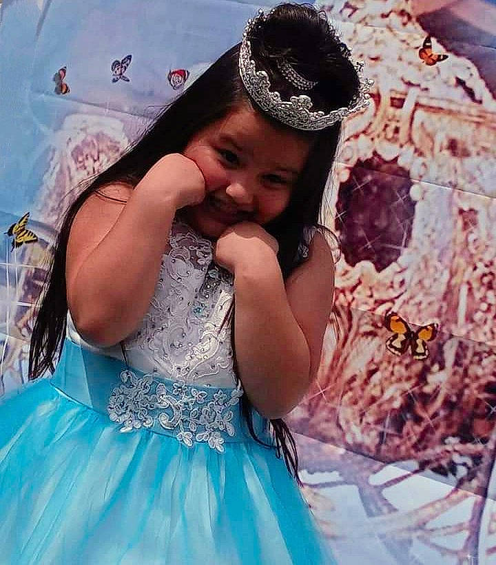 Reina is registered to the contest to win money with this photo: beauty, black_hair, bridal_accessory, bridal_clothing, child, dress, embellishment, fashion_design, flash_photography, formal_wear, fun, gown, hairstyle, happy, headpiece, headwear, long_hair, person, pink, skin