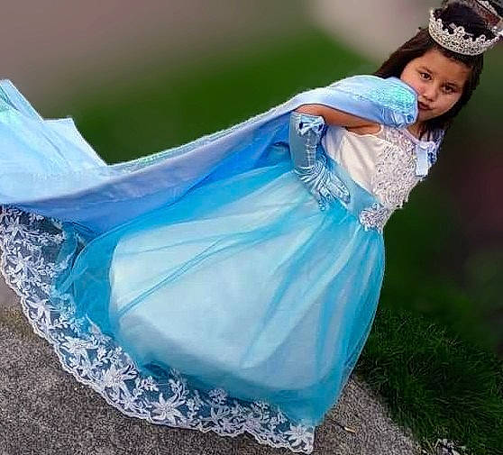 Reina is registered to the contest to win money with this photo: bridal_accessory, bridal_clothing, costume, dress, electric_blue, entertainment, event, fashion_accessory, flash_photography, formal_wear, gown, grass, hair_accessory, happy, headpiece, jewellery, people_in_nature, performing_arts, person, sandal