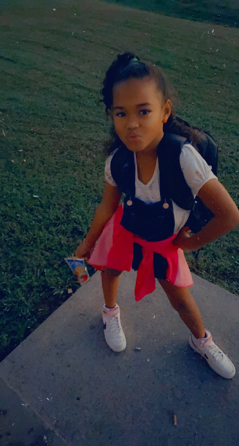 Alexandra is registered to the contest to win money with this photo: asphalt, baby_toddler_clothing, dress, electric_blue, eye, face, footwear, grass, hair, hairstyle, happy, head, human_leg, person, sandal, shoe, shoulder, sneakers, summer, thigh