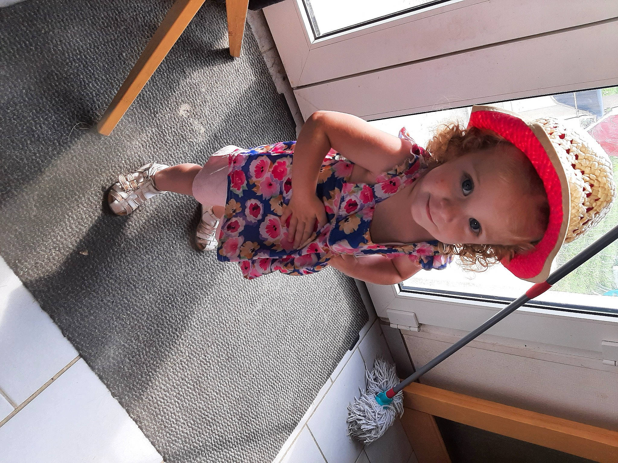 Noéline a rejoint le concours — aidez-le/la à gagner de superbes lots ! automotive_exterior, baby, baby_products, baby_toddler_clothing, child, comfort, flooring, fun, happy, hat, human_leg, leisure, magenta, pattern, person, room, smile, sock, textile, thigh