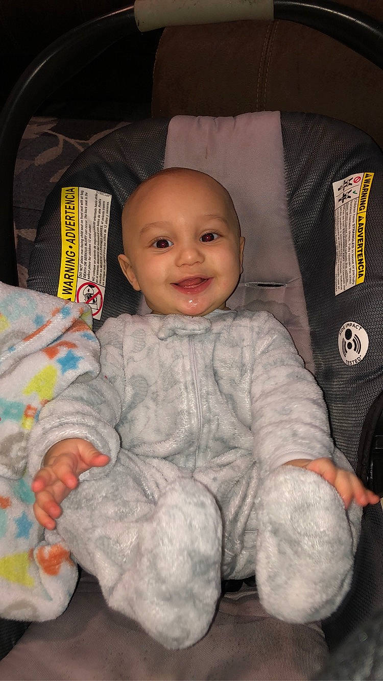 Daxton is registered to the contest to win money with this photo: baby, baby_toddler_clothing, car_seat, cheek, child, comfort, eye, facial_expression, hairstyle, head, human_body, iris, joy, nose, person, product, sitting, skin, sleeve, smile
