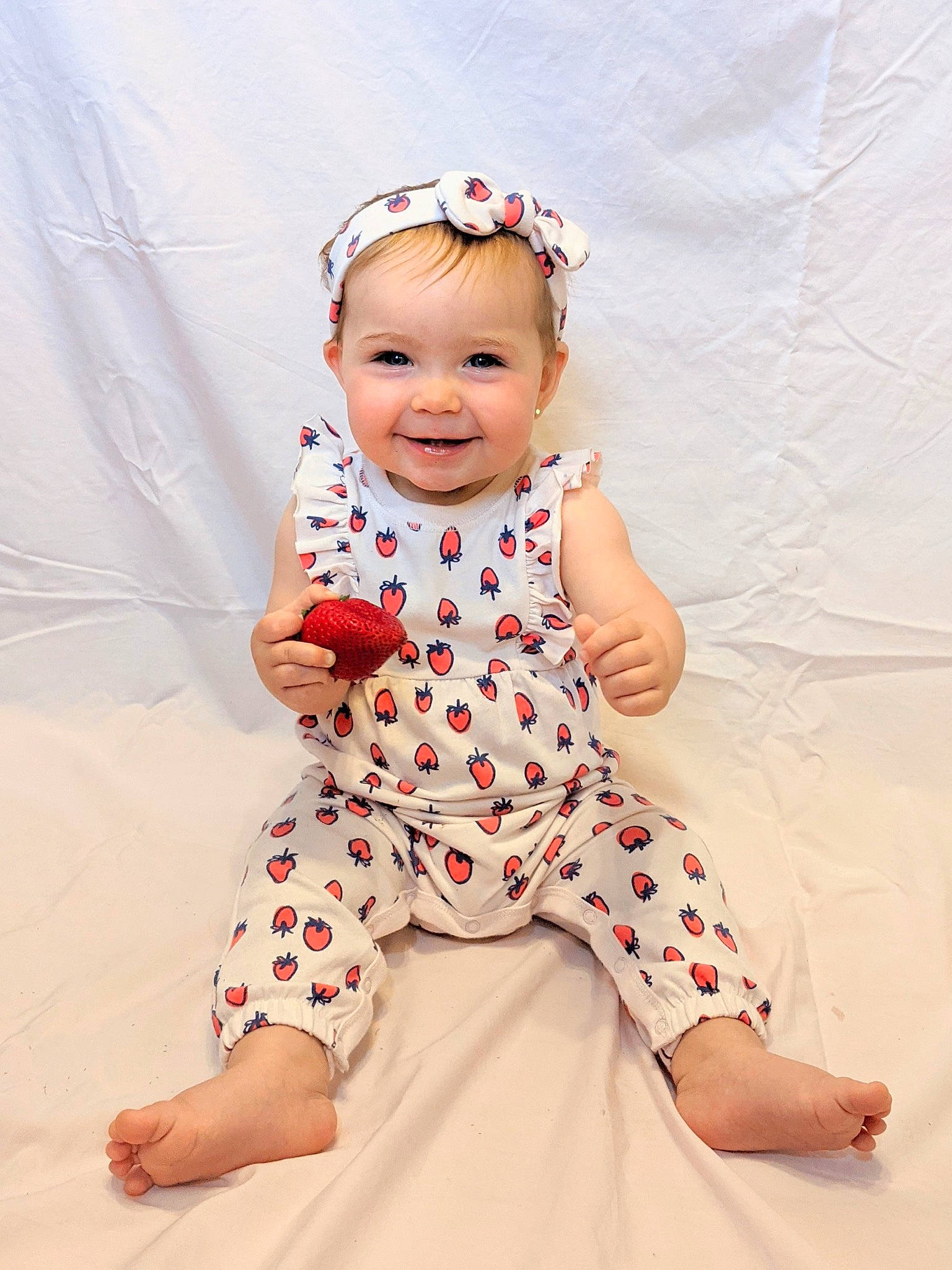 Cora joined the competition — help win amazing prizes! baby, baby_toddler_clothing, child, collar, dress, eye, fun, happy, head, headband, human_body, joy, one_piece_garment, pattern, person, pink, skin, sleeve, smile, t_shirt