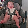 Maylie a rejoint le concours — aidez-le/la à gagner de superbes lots ! baby, child, clothing, eyes, face, feet, furniture, hand, happy, high_chair, indoor, infant, legs, mouth_open, person, seat, smiling, straps, table, wood