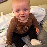 Colsen joined the competition — help win amazing prizes! baby, black_pants, blanket, brown_shirt, child, clothing, cozy, cute, eyes, face, happy, indoor, infant, portrait, sitting, smile, soft_texture, warm, white_socks, young