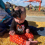 Henley is registered to the contest to win money with this photo: adult, architecture, baby, building, clothing, face, female, food, grain, head, motorcycle, outdoors, pants, person, photography, portrait, produce, shelter, transportation, woman