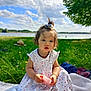 Jeanne a rejoint le concours — aidez-le/la à gagner de superbes lots ! toddler, child, outdoor, grass, lake, sky, clouds, tree, dress, toy, blanket, sunlight, nature, summer, greenery, portrait, curly_hair, sitting, play, cute
