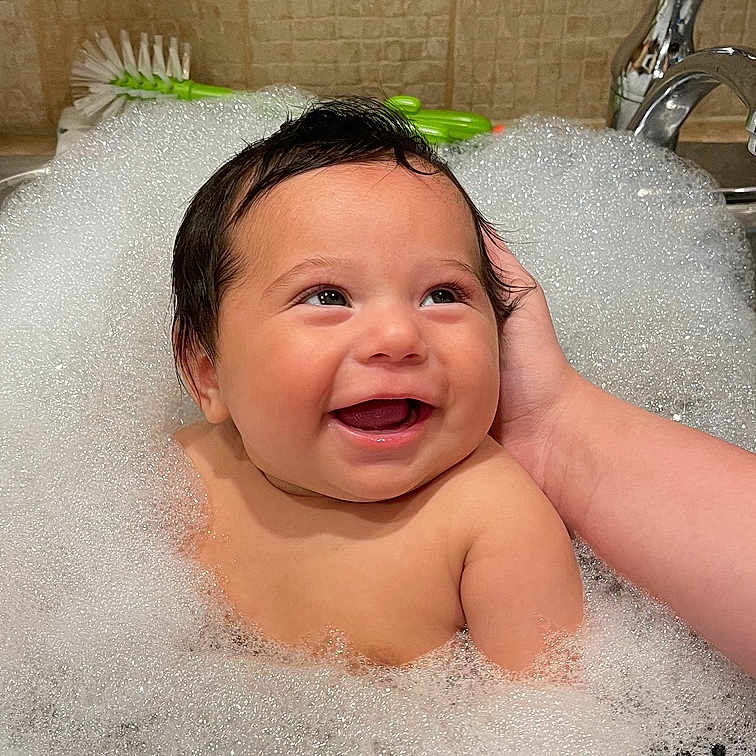 Gerardo joined the competition — help win amazing prizes! baby, babylaughing, bathing, bathtub, bodypart, bubble, face, happy, head, laughing, mouth, newborn, person, photography, portrait, sink, sinkfaucet, smile, tub, washing