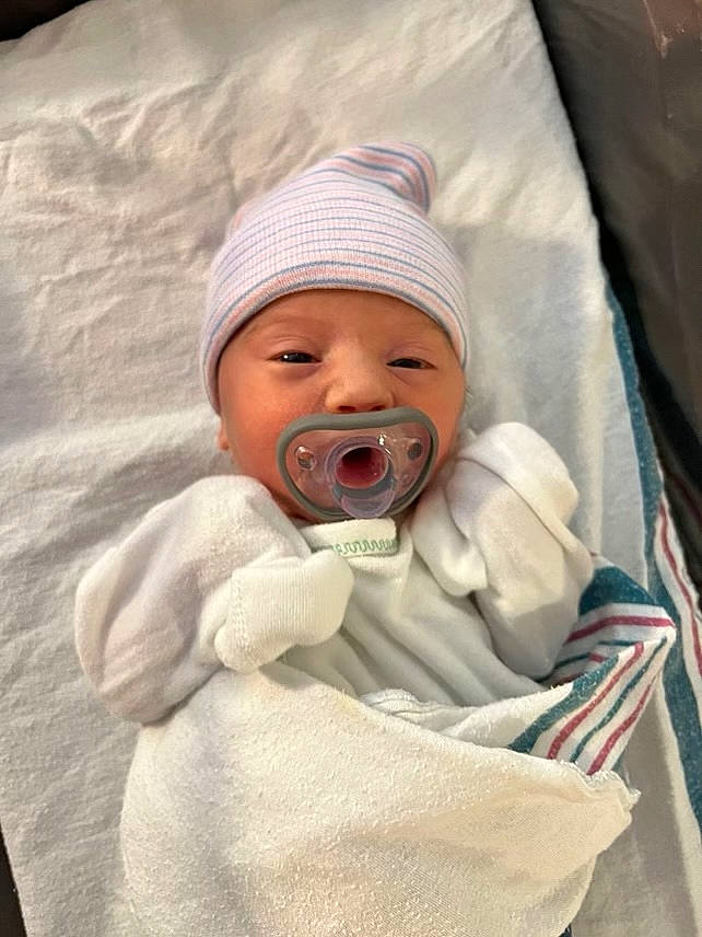 Emersyn is registered to the contest to win money with this photo: baby, baby_products, baby_safety, baby_sleeping, baby_toddler_clothing, beanie, child, chin, comfort, face, hat, head, headwear, linens, person, room, sleeve, toddler, winter