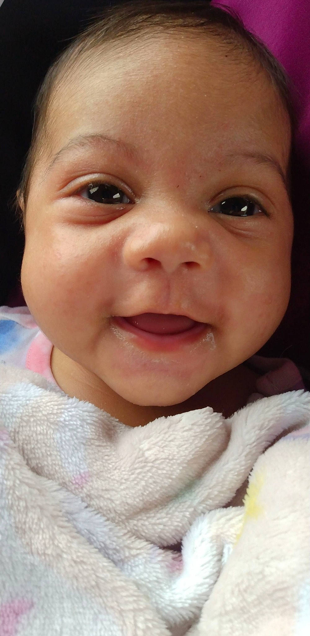 Layla is registered to the contest to win money with this photo: baby, baby_toddler_clothing, cheek, child, chin, ear, eyebrow, eyelash, fun, gesture, happy, iris, lip, mouth, neck, nose, person, pink, skin, smile