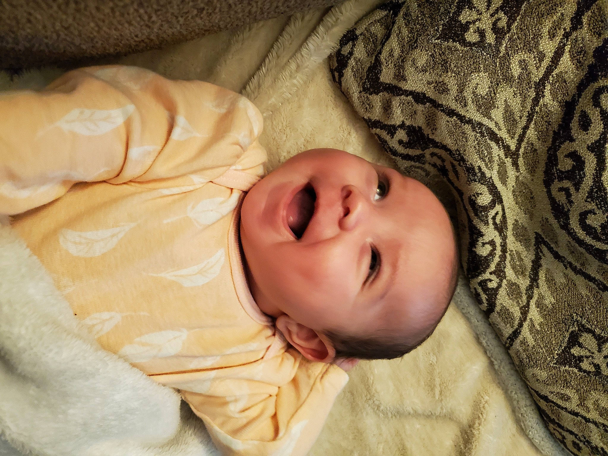 Rosa Josephine is registered to the contest to win money with this photo: baby, baby_toddler_clothing, bedtime, cheek, child, comfort, eye, fur, grass, head, headwear, iris, linens, nose, person, plant, skin, sleeve, smile, toddler