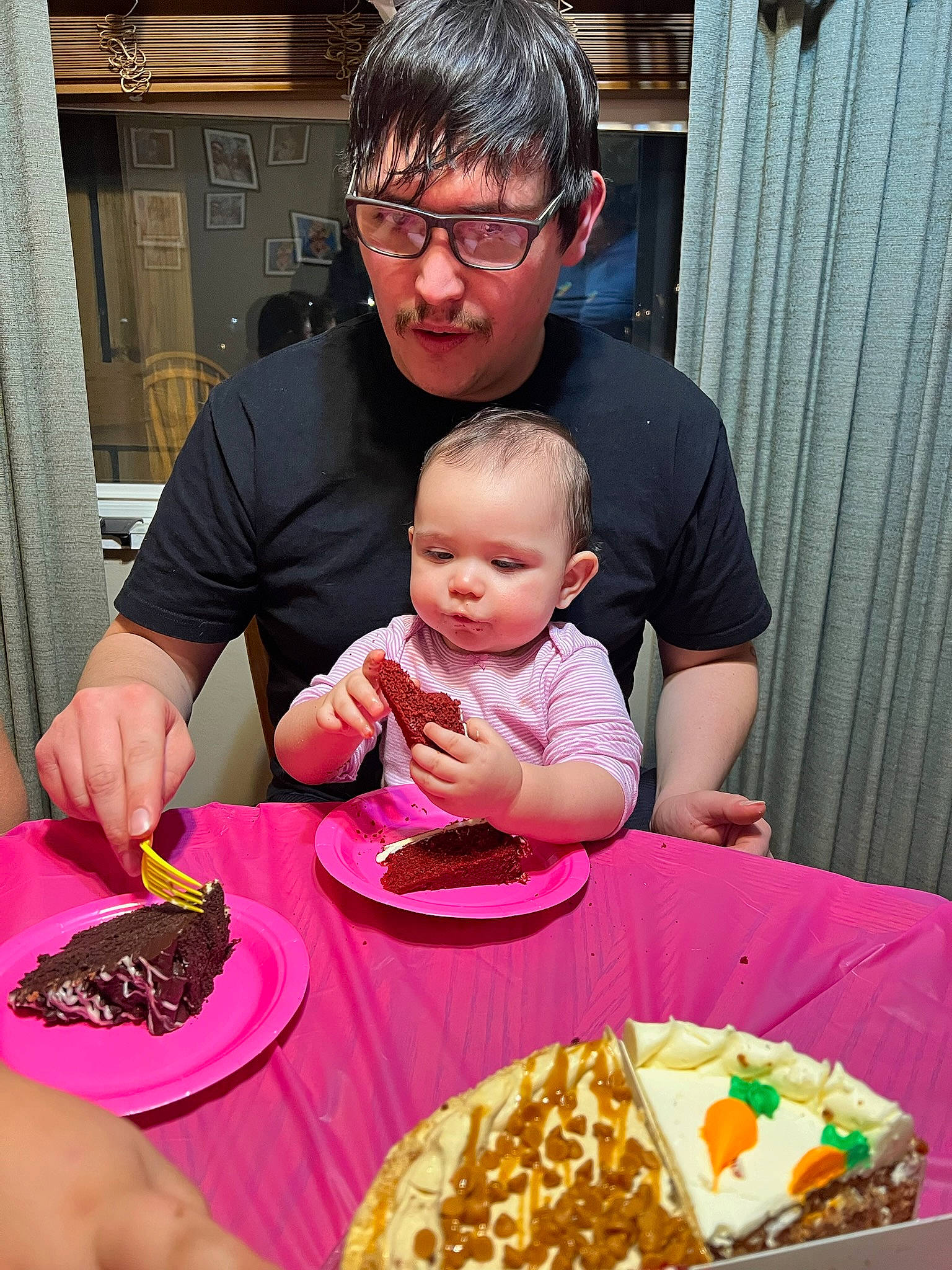 Rosa Josephine is registered to the contest to win money with this photo: baby, baked_goods, birthday, birthday_cake, cake, cake_decorating, chair, cuisine, curtain, dessert, dish, event, food, ingredient, person, plate, sharing, sweetness, table, tableware