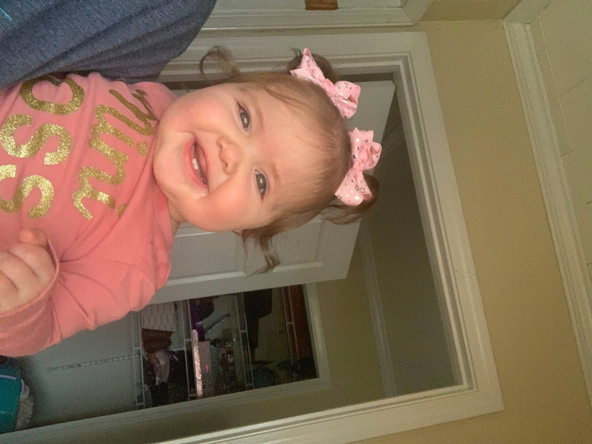 Oaklyn is registered to the contest to win money with this photo: baby, baby_toddler_clothing, cheek, chin, dress, ear, eyebrow, finger, fun, happy, human_body, iris, joy, lip, mouth, nose, person, pink, skin, sleeve