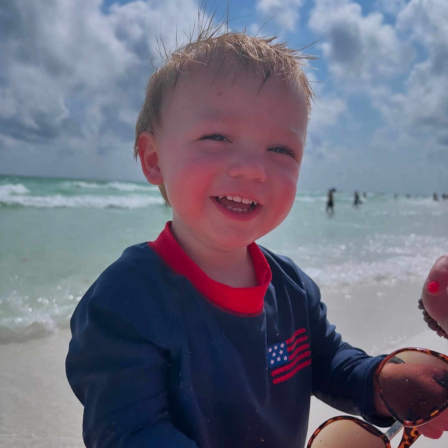 Stetson joined the competition — help win amazing prizes! baby, beach, bodypart, coast, face, happy, head, mouth, nature, outdoors, person, photography, portrait, sea, shoreline, sky, smile, summer, teeth, water