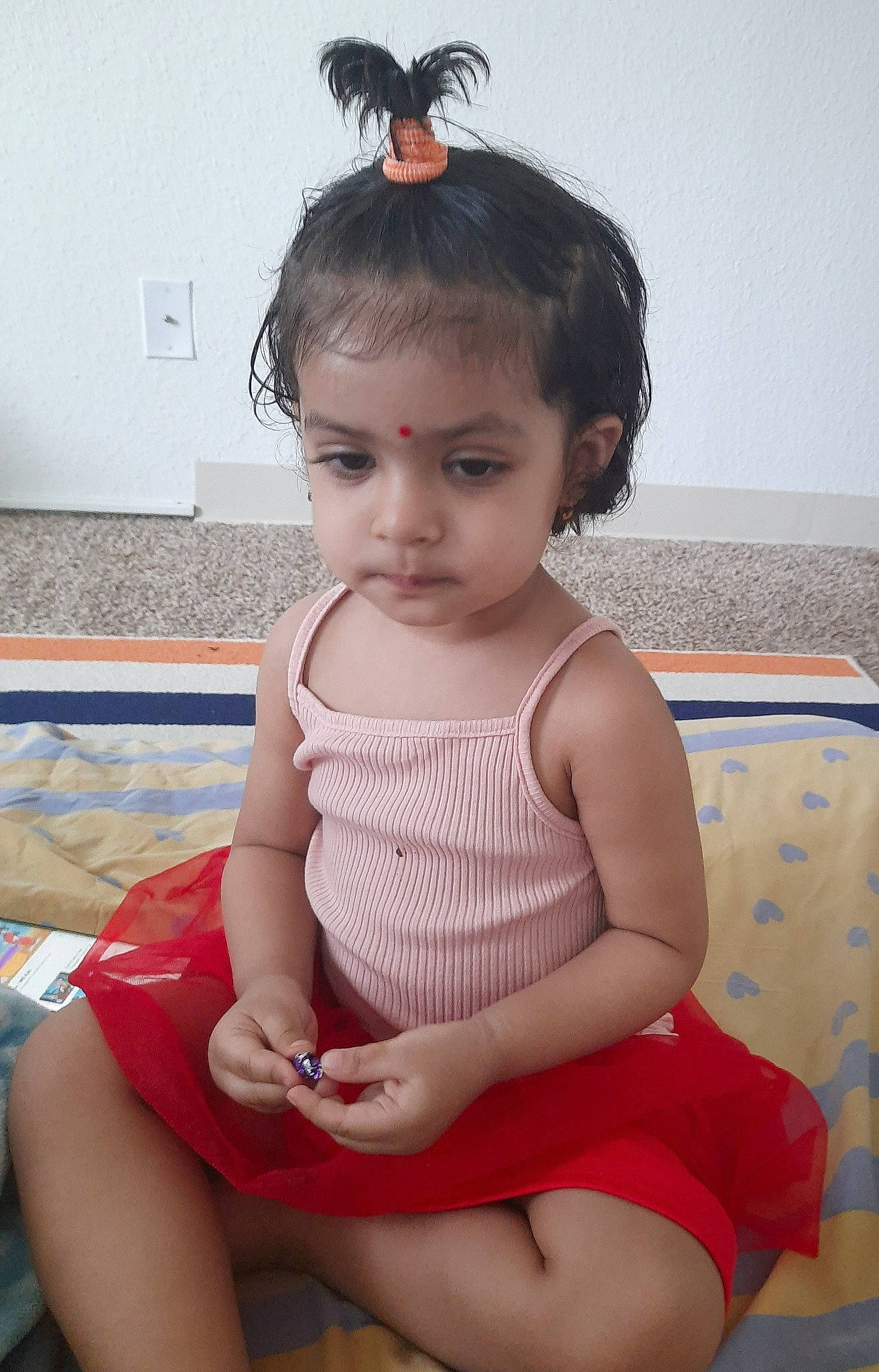 Suvanshi is registered to the contest to win money with this photo: baby_toddler_clothing, cheek, chest, chin, eyelash, hair, hairstyle, head, human_leg, joint, knee, leg, neck, organ, person, pink, skin, thigh, toddler, trunk