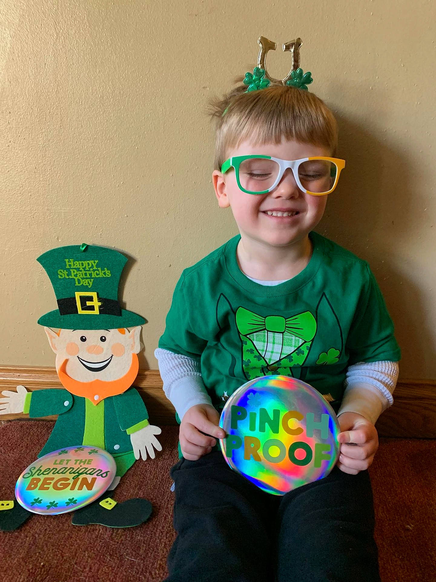 Alister joined the competition — help win amazing prizes! child, costume, fictional_character, glasses, green, holiday, joy, leprechaun, party_hat, person, saint_patricks_day, smile, toddler