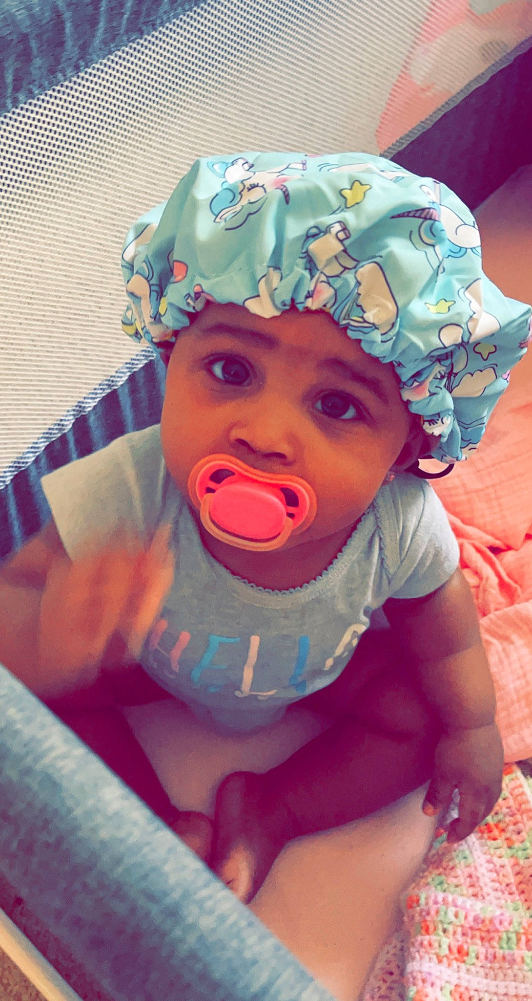 Gabrielle is registered to the contest to win money with this photo: baby, baby_toddler_clothing, cheek, chin, comfort, cool, eye, eyebrow, fun, happy, hat, head, headgear, headwear, mouth, person, pink, purple, skin, sleeve