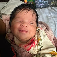 Virginia joined the competition — help win amazing prizes! baby, smiling, face, blanket, bed, indoor, person, clothing, infant, portrait, cozy, soft, happy, sleepy, newborn, toddler, cute, warm, resting, comfort