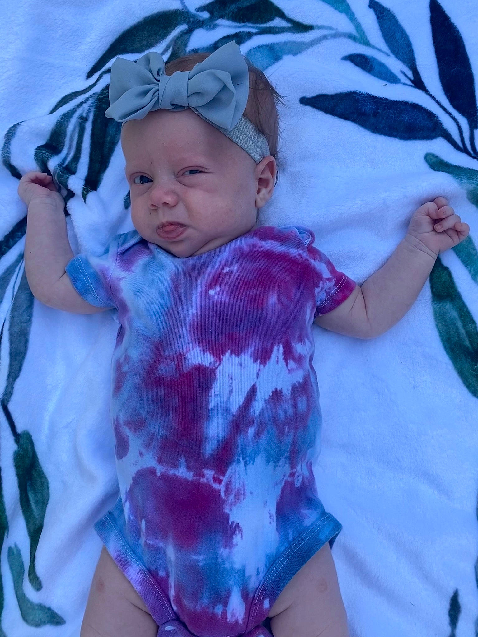 Kaia joined the competition — help win amazing prizes! azure, baby, baby_toddler_clothing, cheek, child, comfort, cool, finger, fun, happy, headwear, linens, magenta, pattern, person, pink, purple, skin, sleeve, textile