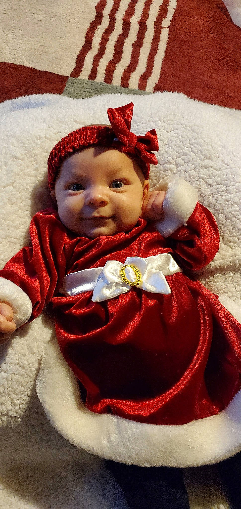 Isabella is registered to the contest to win money with this photo: baby, cheek, child, doll, person, red, toddler