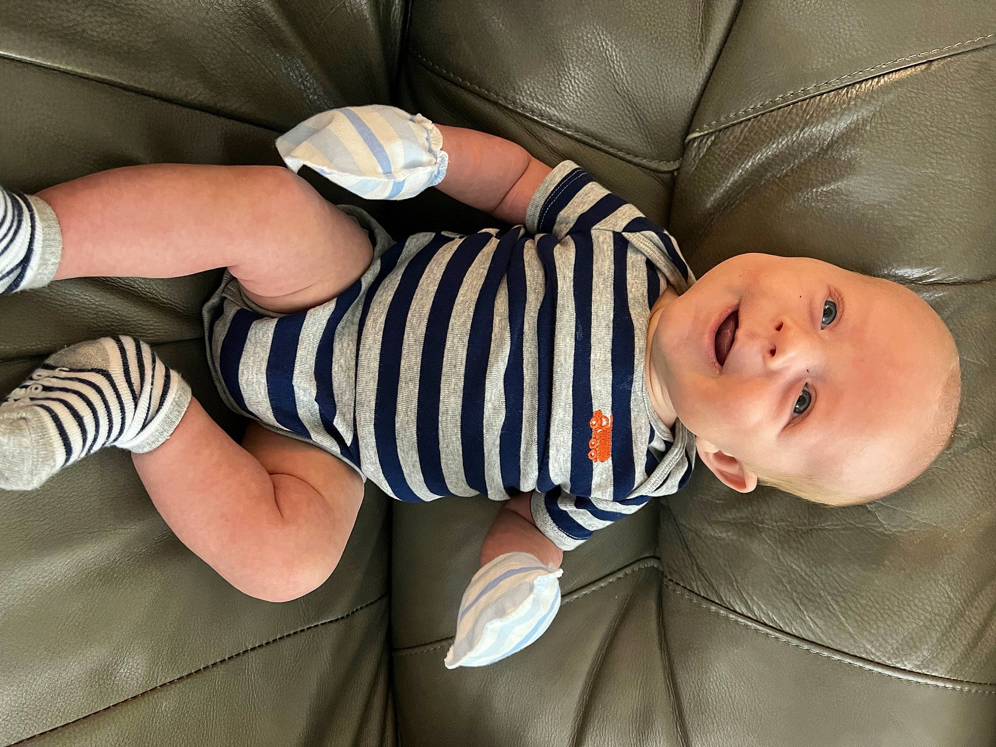Michael joined the competition — help win amazing prizes! arm, baby, baby_toddler_clothing, cheek, child, clothing, comfort, elbow, knee, leg, mammal, pattern, person, product, skin, sleeve, smile, sock, thigh, toddler