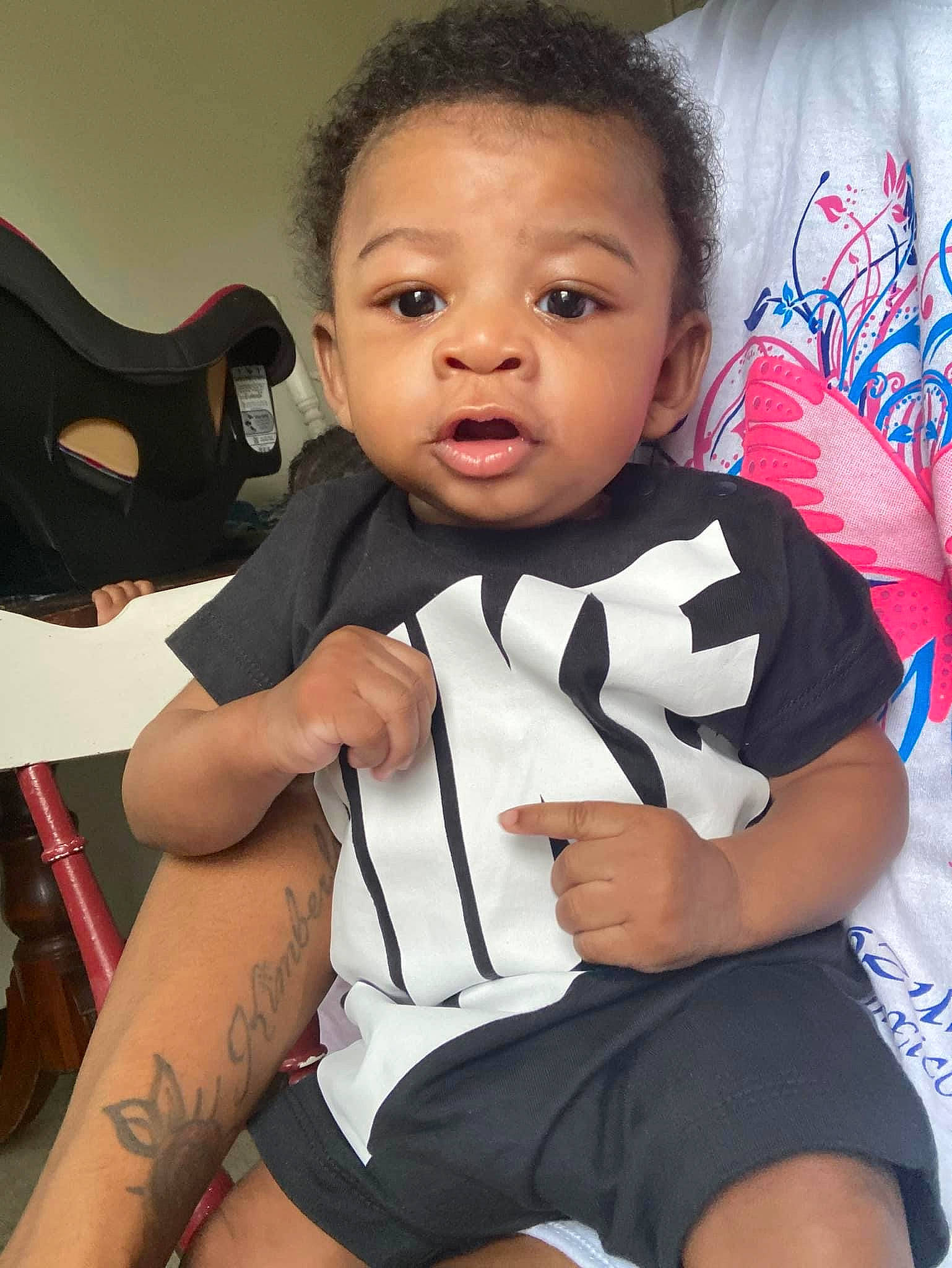 Aries joined the competition — help win amazing prizes! baby_toddler_clothing, black, black_hair, cheek, elbow, eye, eyelash, hairstyle, happy, head, knee, leg, musical_instrument, neck, person, skin, sleeve, thigh, toddler, trunk