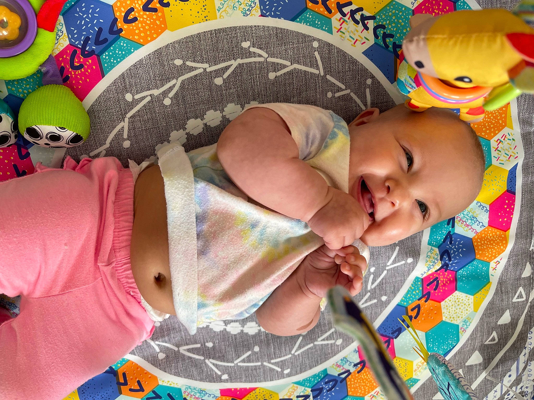 Gianni joined the competition — help win amazing prizes! arm, baby, baby_products, baby_toddler_clothing, beauty, child, comfort, finger, green, happy, headgear, linens, pattern, person, pink, product, skin, stuffed_toy, toddler, toy