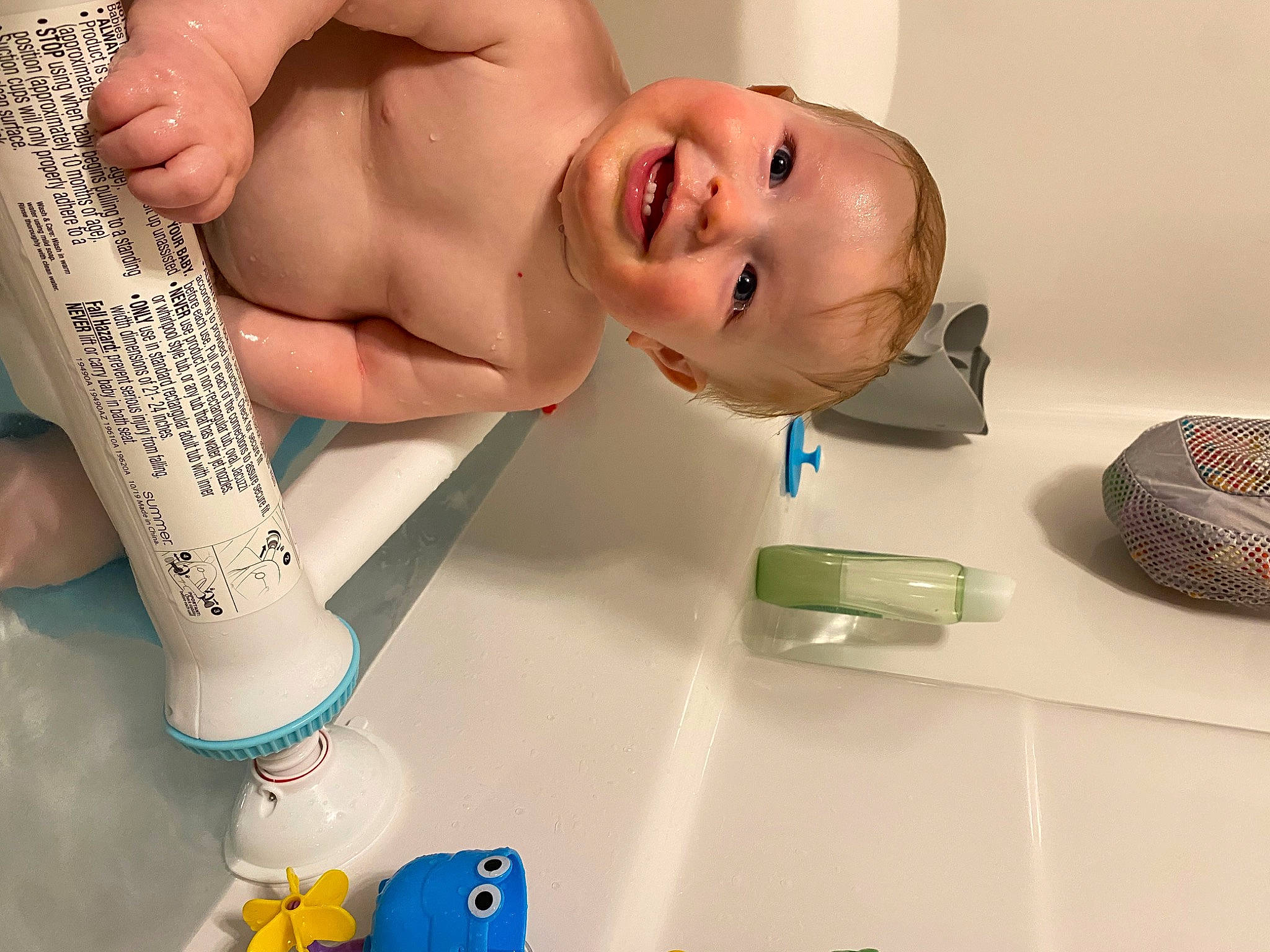 Hudson is registered to the contest to win money with this photo: abdomen, baby, baby_products, bathing, chest, child, eyebrow, eyelash, finger, joy, mouth, nail, organ, person, personal_care, plastic, service, skin, smile, thumb