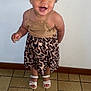 Emy a rejoint le concours — aidez-le/la à gagner de superbes lots ! toddler, child, smiling, girl, standing, curly_hair, pigtails, leopard_print, skirt, sandal, floor, tile_floor, indoor, wall, happy, cute, portrait, clothing, person, fashion