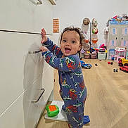 Leearnah joined the competition — help win amazing prizes! cabinet, child, colorful, curious, dollhouse, floor, furniture, happy, home, indoor, kitchen, pajamas, person, playroom, smiling, standing, toddler, toy, wooden_floor, young_child