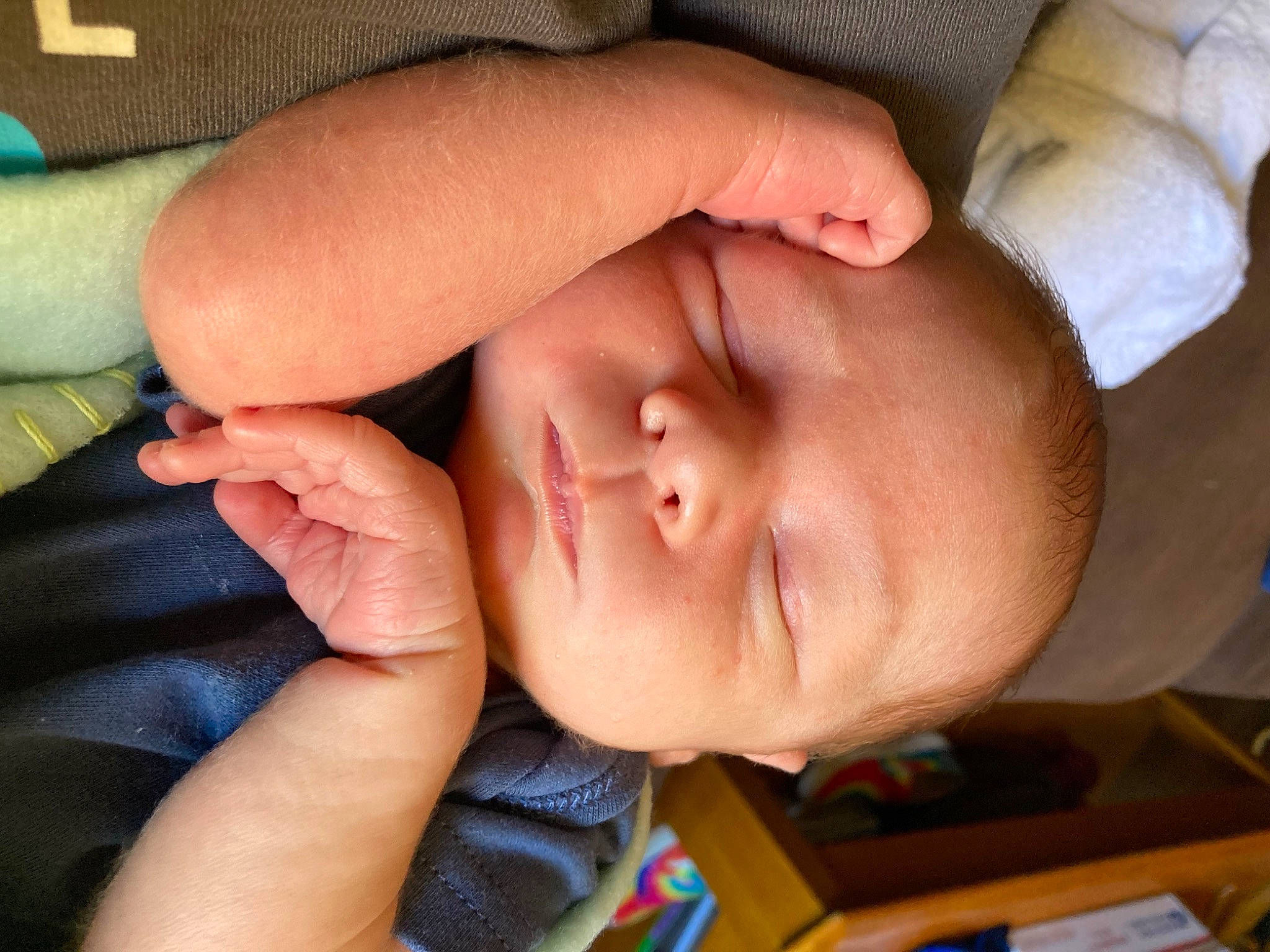 Levi is registered to the contest to win money with this photo: baby, cheek, comfort, ear, eyebrow, eyelash, finger, gesture, hair, happy, head, human_body, iris, lip, mouth, nail, nose, person, skin, thumb