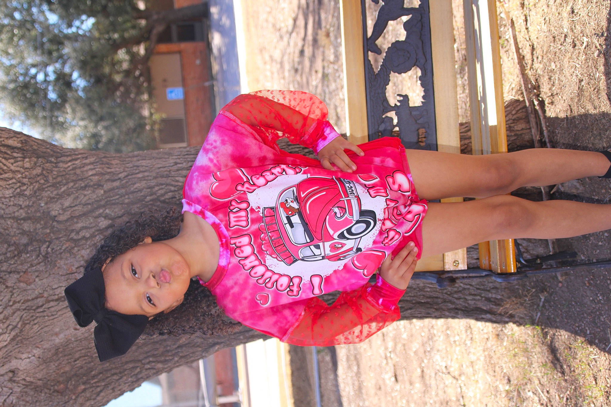 Isabel is registered to the contest to win money with this photo: calf, carmine, dress, flesh, foot, fun, human_leg, leisure, magenta, pattern, person, pink, red, street_fashion, thigh, tree, vacation, visual_arts, waist, winter