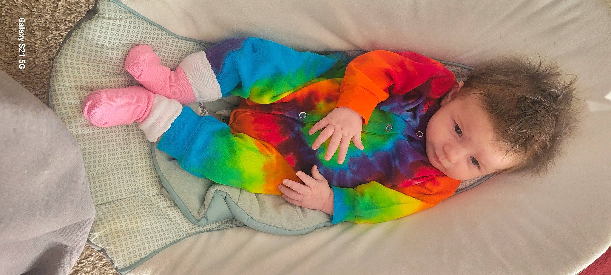 Kenadie joined the competition — help win amazing prizes! baby, baby_products, baby_toddler_clothing, child, comfort, event, finger, fun, gesture, happy, head, linens, nail, orange, pattern, person, room, textile, thumb, toddler