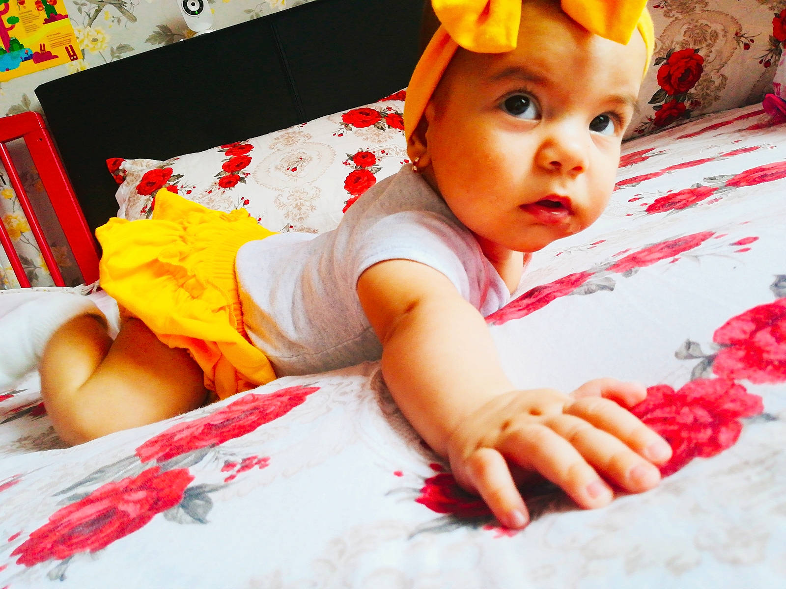 Beatrice is registered to the contest to win money with this photo: baby, baby_products, baby_toddler_clothing, baby_toys, child, finger, hand, person, play, product, skin, textile, toddler, yellow