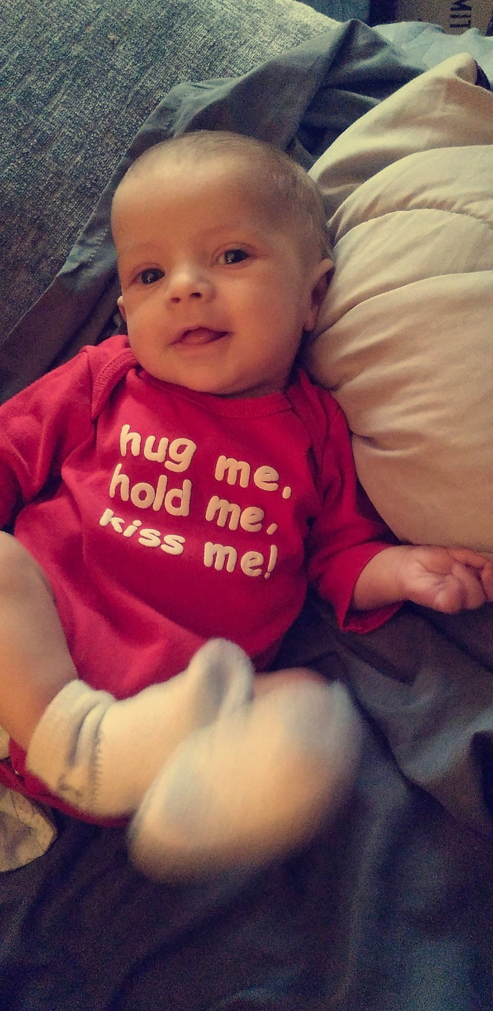 Keith is registered to the contest to win money with this photo: arm, baby_toddler_clothing, cheek, comfort, eye, eyebrow, face, forehead, hair, hand, happy, head, human_body, iris, lip, mouth, nose, person, skin, sleeve