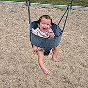 Bellatrix joined the competition — help win amazing prizes! baby, baby_swing, bare_feet, chains, child, grass, happy, infant, joy, laughing, outdoor, pink_clothing, play, playground, portrait, residential_background, sandbox, sitting, smiling, swing