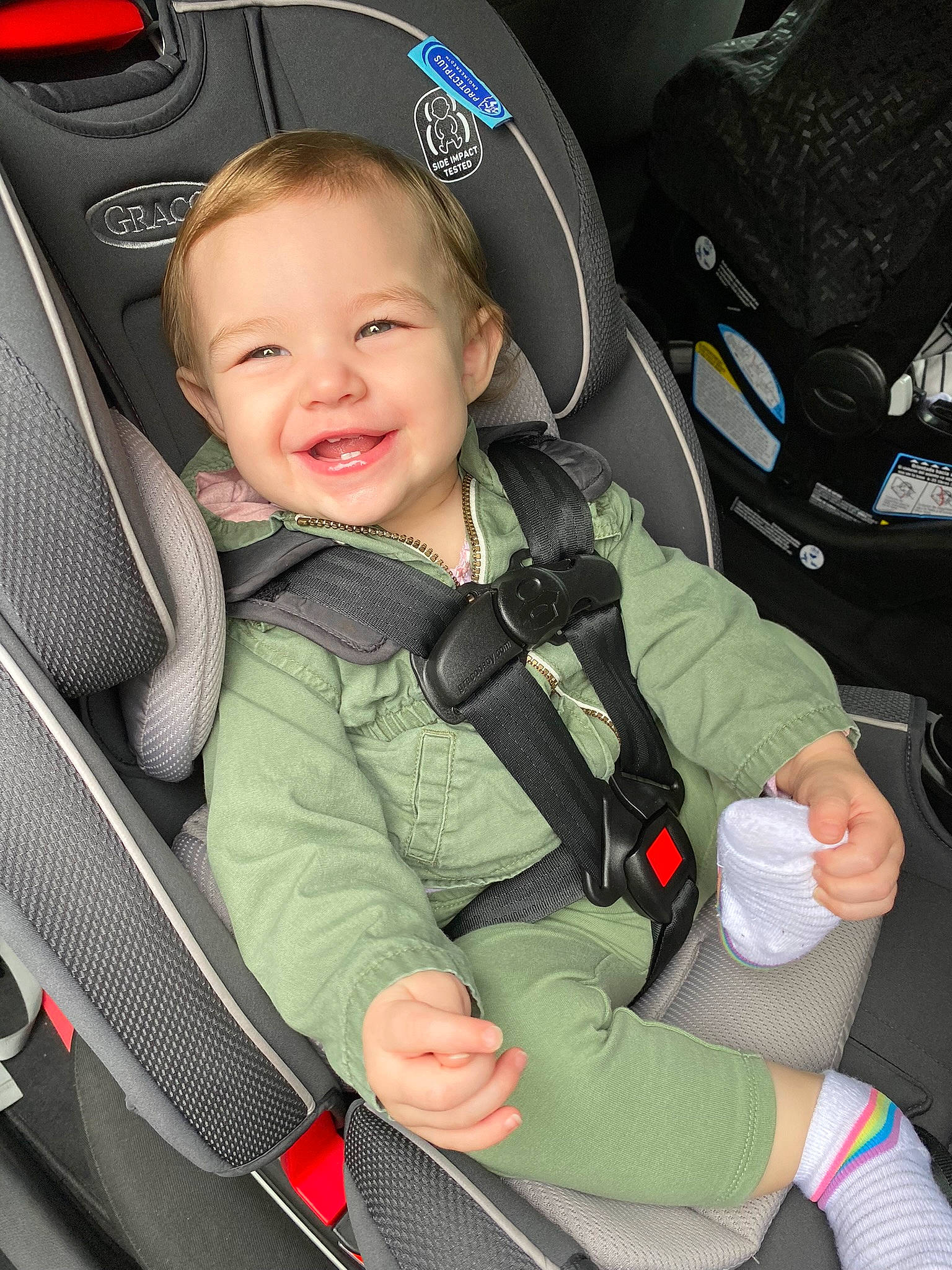 Madelynn joined the competition — help win amazing prizes! auto_part, automotive_design, baby, baby_carriage, baby_in_car_seat, baby_products, car_seat, car_seat_cover, child, comfort, family_car, head_restraint, joy, motor_vehicle, person, plant, seat_belt, sitting, smile, steering_wheel