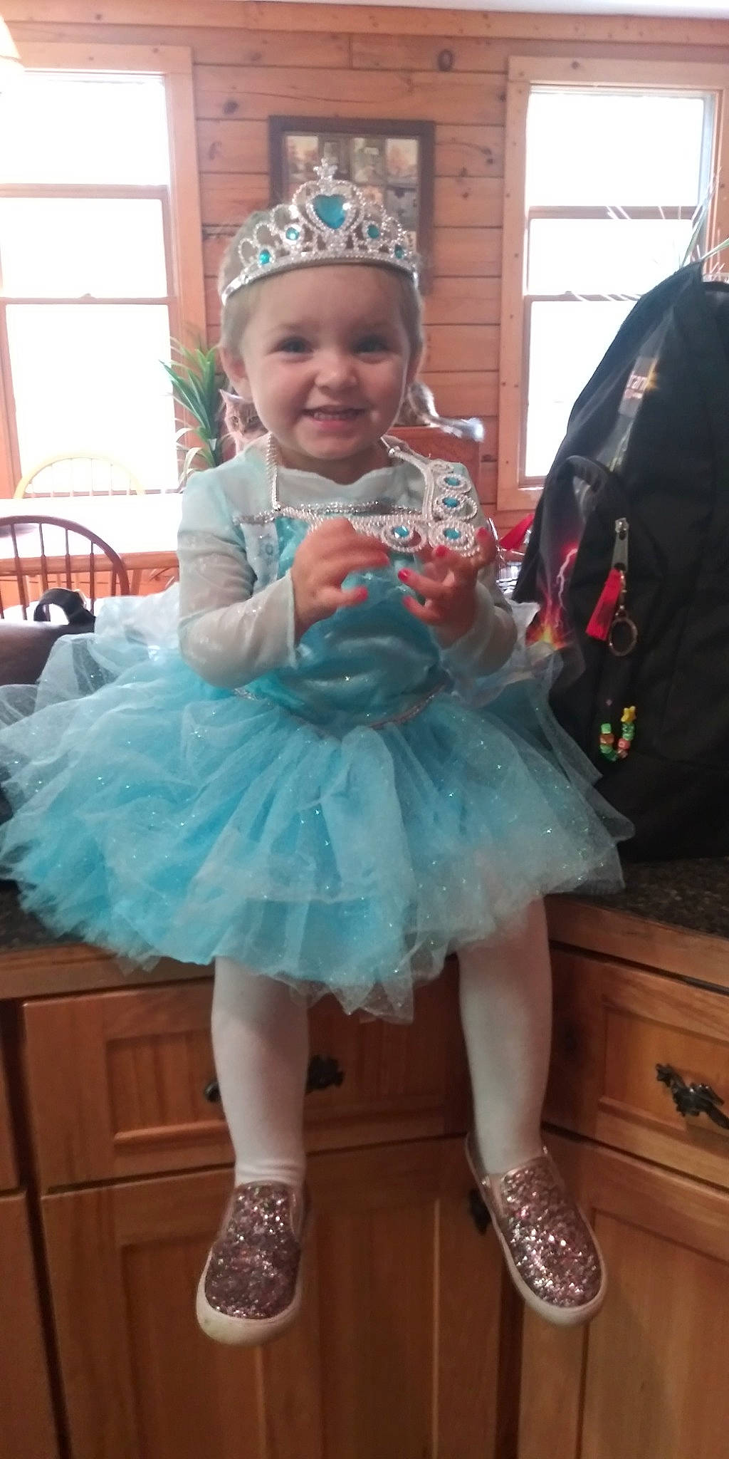Mckinley is registered to the contest to win money with this photo: ballet_tutu, child, clothing, costume, dress, hair_accessory, headgear, joy, person, smile, toddler, turquoise