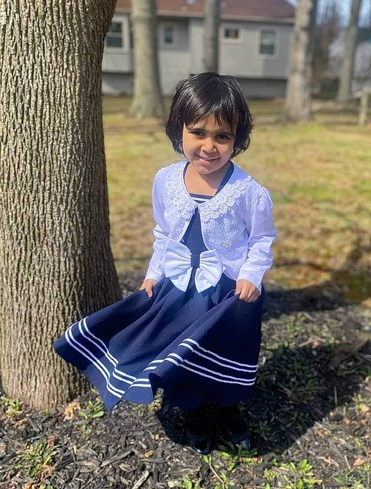 Penelope Ann is registered to the contest to win money with this photo: black_hair, dress, electric_blue, eye, face, flash_photography, formal_wear, fun, grass, hair, happy, head, human_body, joy, leisure, people_in_nature, person, plant, sleeve, smile