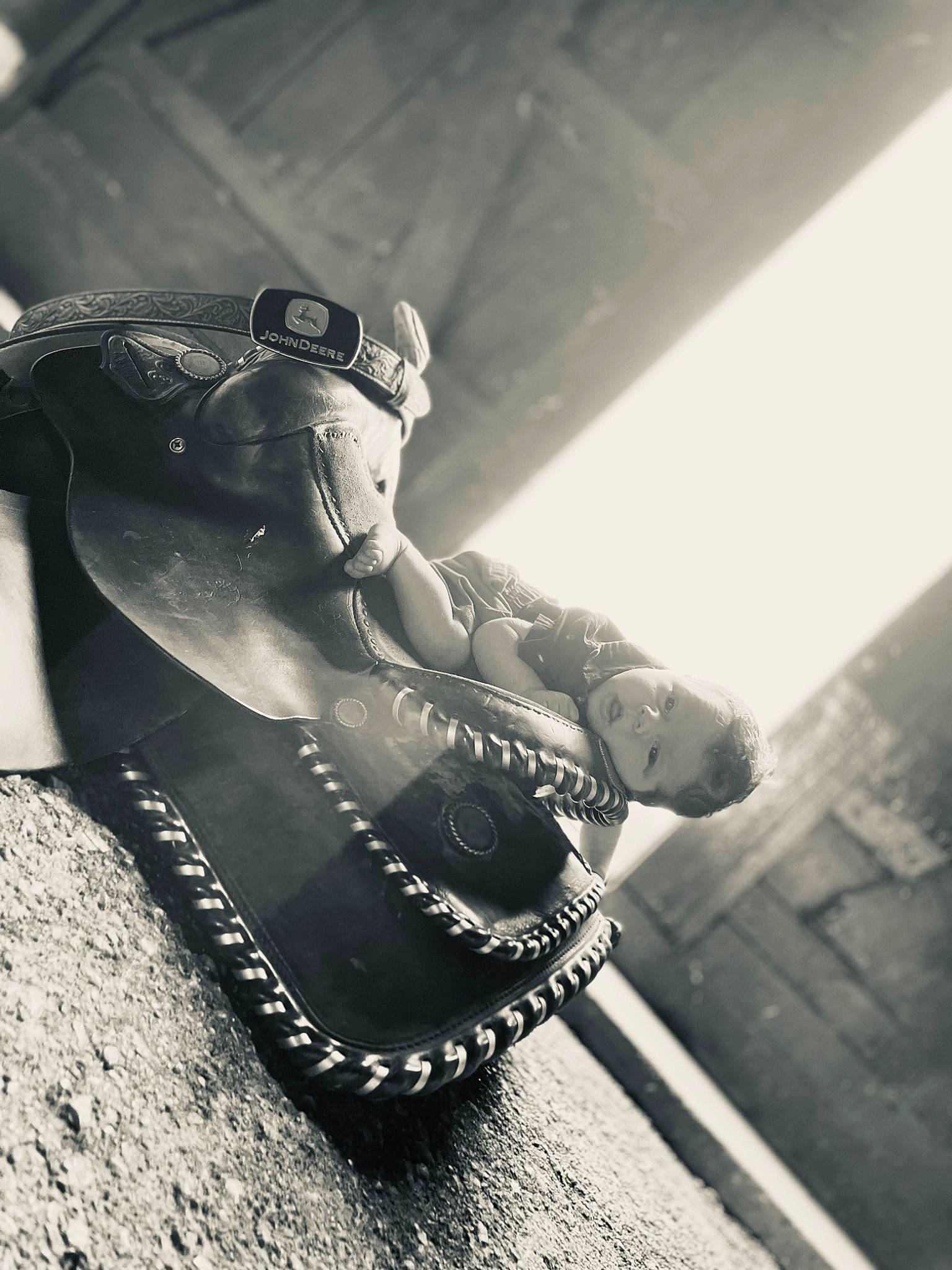 Brayson is registered to the contest to win money with this photo: black_and_white, boot, cloud, elbow, eyewear, fashion_accessory, flash_photography, glove, hat, headgear, human_leg, jewellery, leg, monochrome, monochrome_photography, person, personal_protective_equipment, sitting, style, tints_and_shades