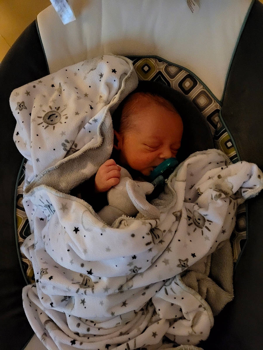 Jasper is registered to the contest to win money with this photo: baby, baby_products, baby_safety, baby_sleeping, baby_toddler_clothing, bed, bedding, bedtime, cheek, child, comfort, head, infant_bed, linens, nap, pattern, person, product, sleeve, textile