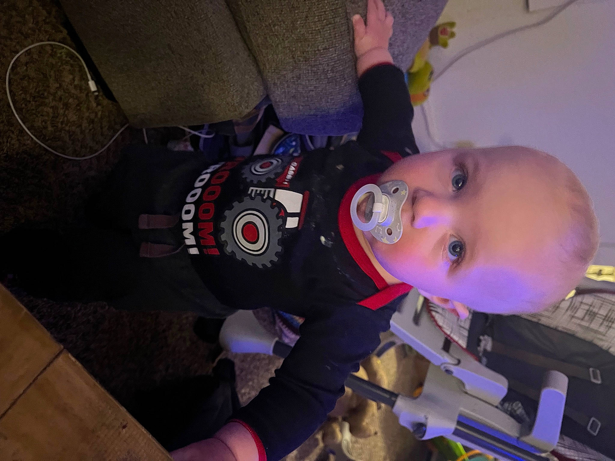 Cole is registered to the contest to win money with this photo: auto_part, child, electric_blue, fun, person, personal_protective_equipment, room, toddler