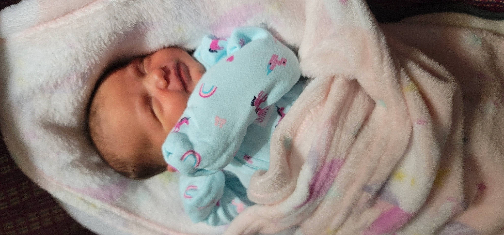 Araya is registered to the contest to win money with this photo: arm, baby, baby_sleeping, baby_toddler_clothing, cheek, chin, comfort, ear, eyebrow, eyelash, finger, gesture, hand, human_body, lip, mouth, nose, person, pink, skin