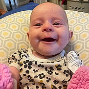 Eden-Pearl joined the competition — help win amazing prizes! baby, smiling, infant, face, clothing, blanket, pillow, pattern, indoors, happy, cute, child, person, portrait, soft, pink, floral, home, cozy, young