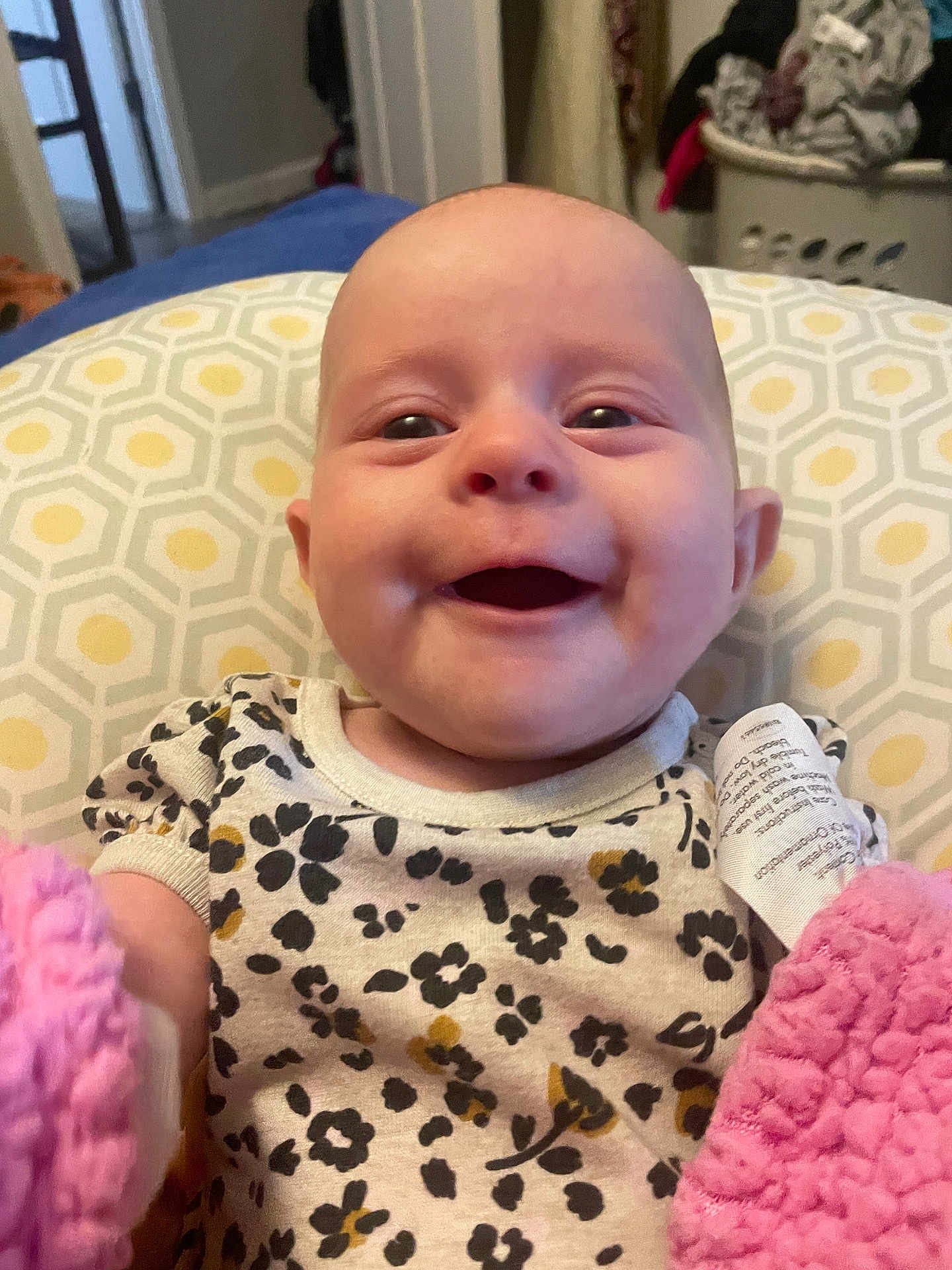 Eden-Pearl joined the competition — help win amazing prizes! baby, smiling, infant, face, clothing, blanket, pillow, pattern, indoors, happy, cute, child, person, portrait, soft, pink, floral, home, cozy, young