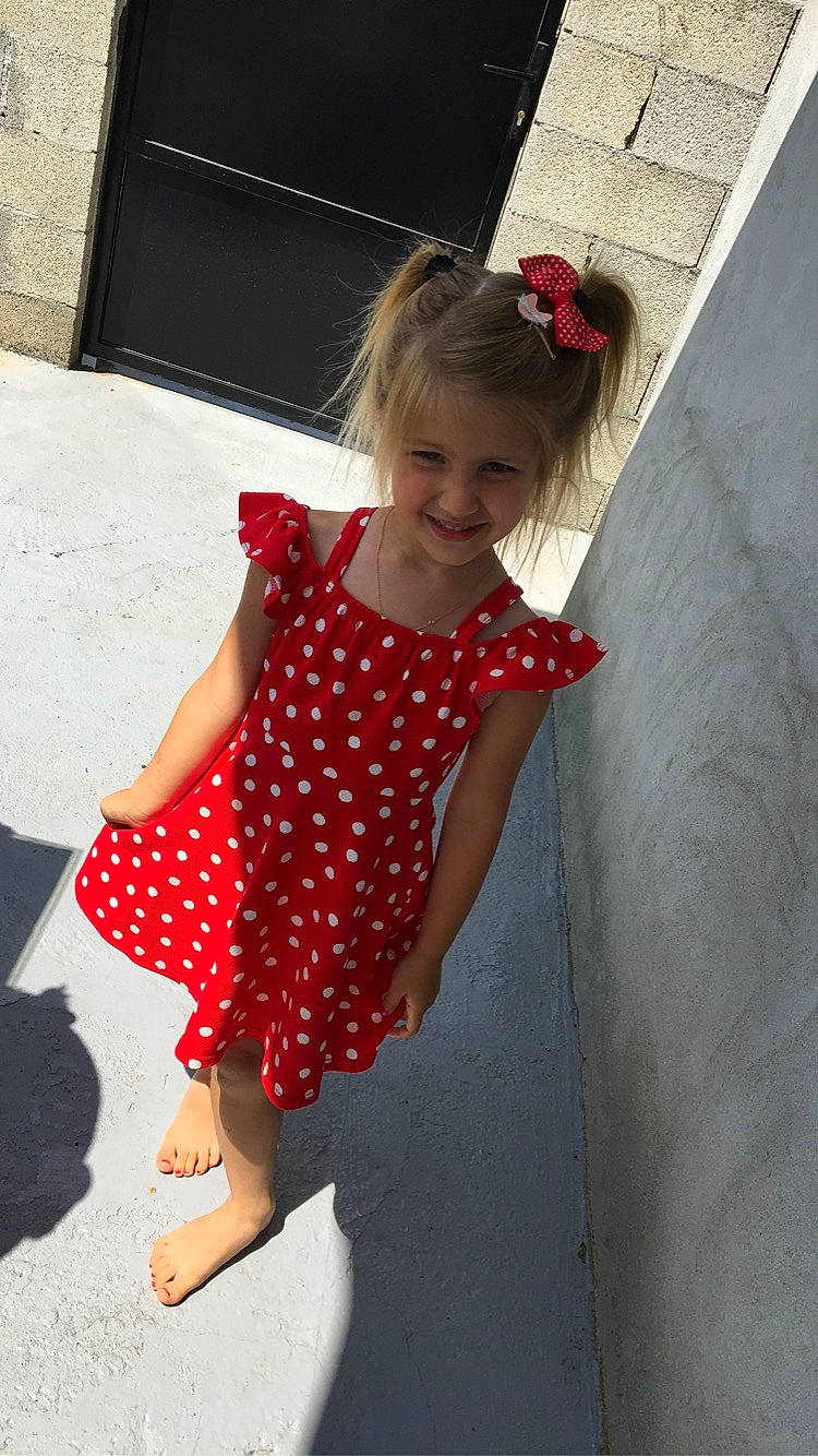 Elina participe au concours pour gagner de l'argent avec cette photo : baby_toddler_clothing, child, child_model, clothing, dance, design, dress, joy, pattern, person, polka_dot, red, ruffle, shoulder, sleeve, textile, toddler