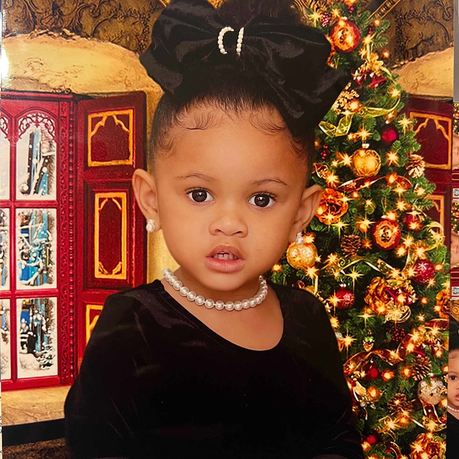 Caylee joined the competition — help win amazing prizes! accessories, baby, christmas, christmasdecorations, clothing, conifer, dress, earring, face, festival, hair, head, jewelry, lighting, necklace, person, photography, plant, portrait, tree